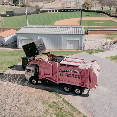 Stinky Pinky Commercial Dumpster Service at a baseball field