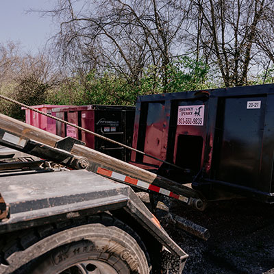 Black Stinky Pinky Roll-Off Dumpster