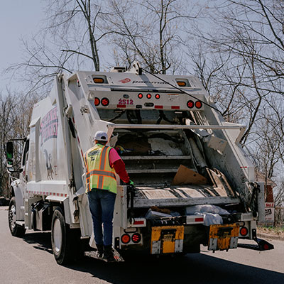 Stinky Pinky back of residential garbage truck