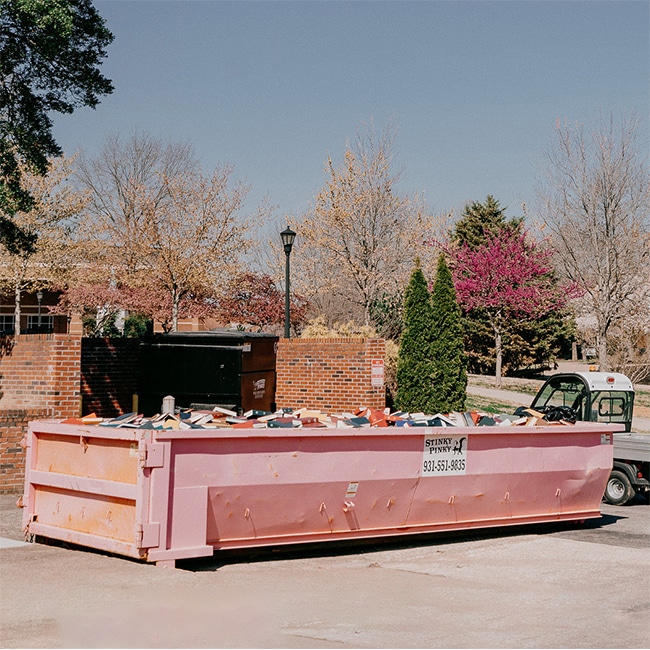 Stinky Pinky Roll Off Dumpster on campus